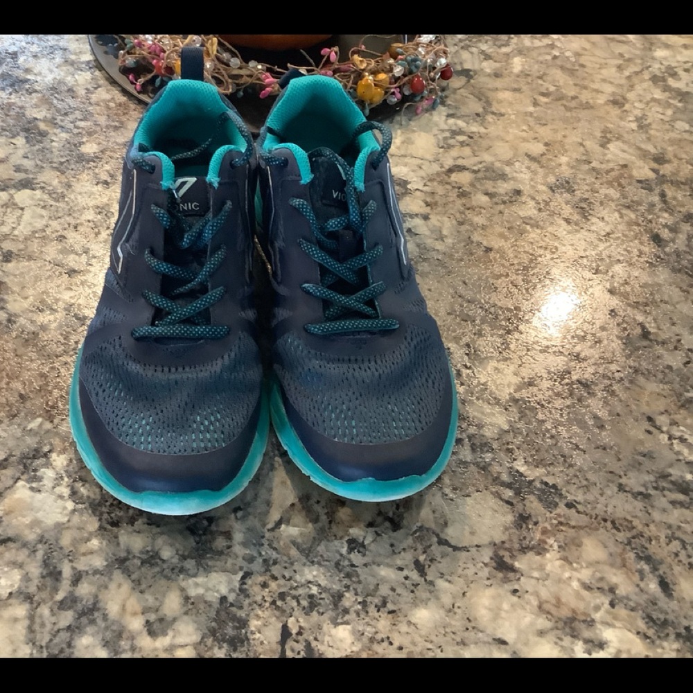 Vionic navy and aqua sneakers in good condition.